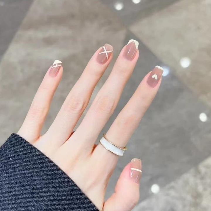 Artistic Press-On Nail Set with Heart and Leaf Designs