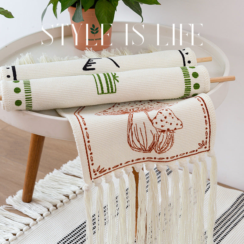 Cotton wall hanging with hand-drawn palm motif and long fringes