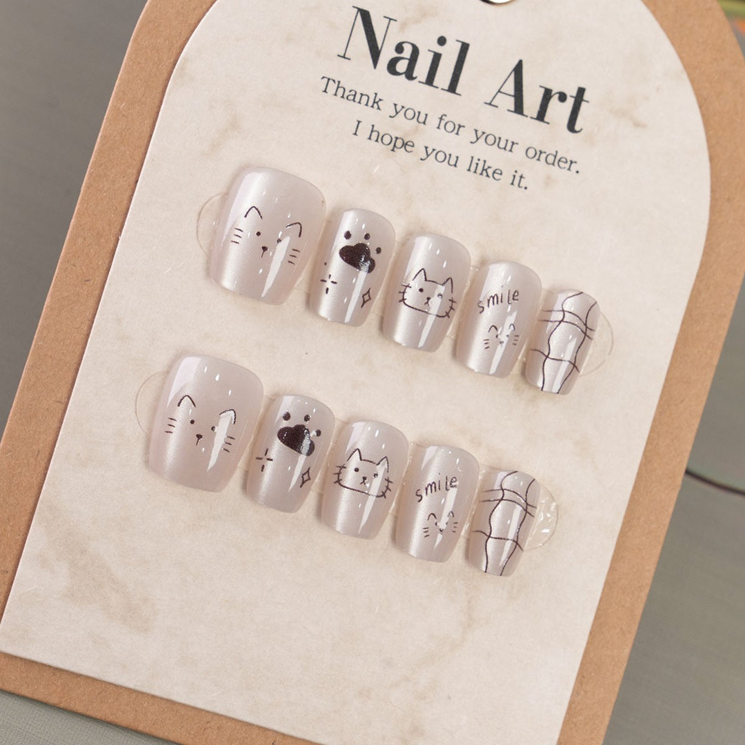 Whimsical Cat-Themed Press-On Nail Art Kalsten