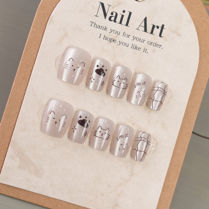 Whimsical Cat-Themed Press-On Nail Art Kalsten