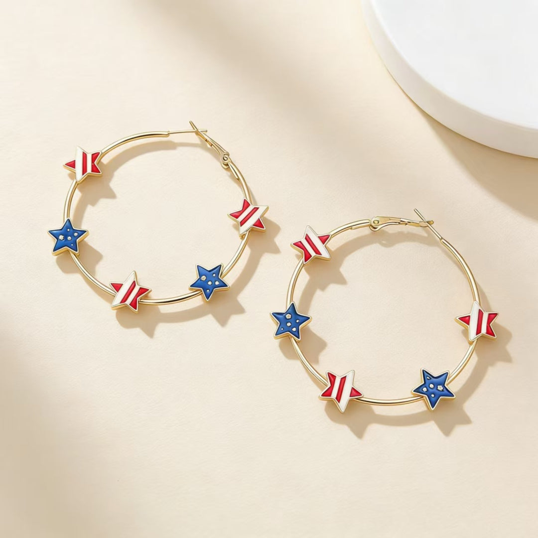 Women's playful hoop earrings with enamel star appliqués and secure click closure Kalsten