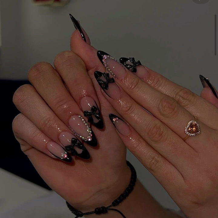 Artificial nail set with glamorous 3D bows and rhinestone embellishments Kalsten