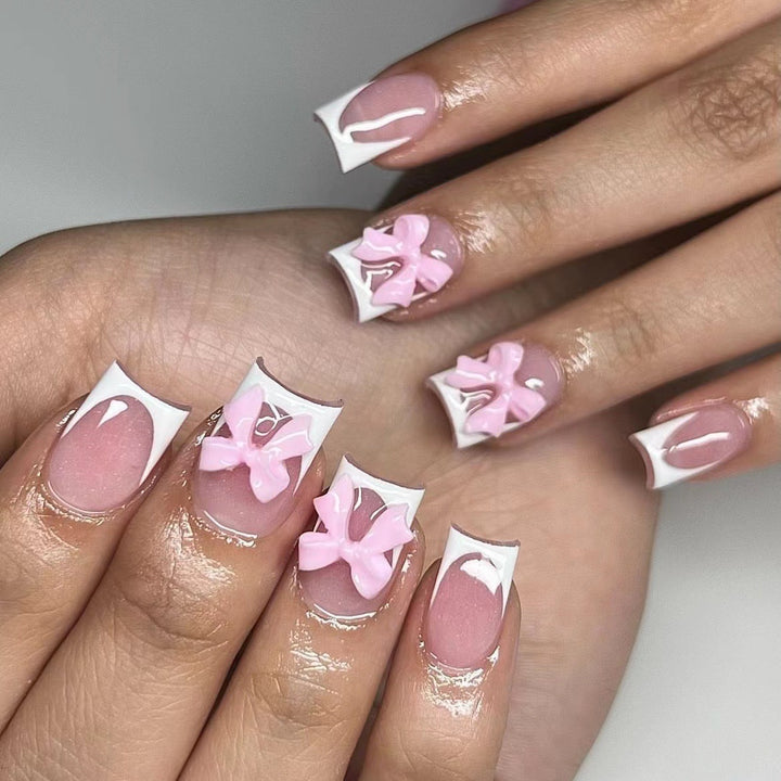 Artificial nails with cute bow designs Kalsten