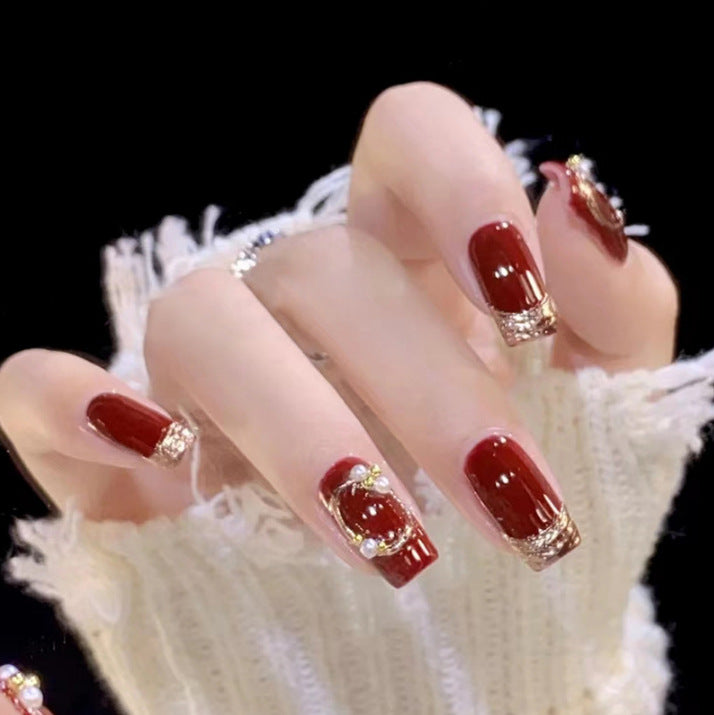 Artistic Nail Art with Glitter and Flower Applications Kalsten