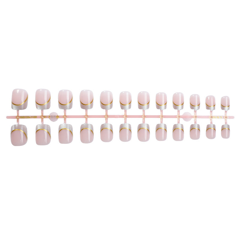 Artificial nail creations with elegant gold trim Kalsten