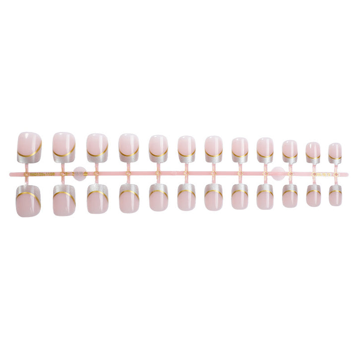 Artificial nail creations with elegant gold trim Kalsten