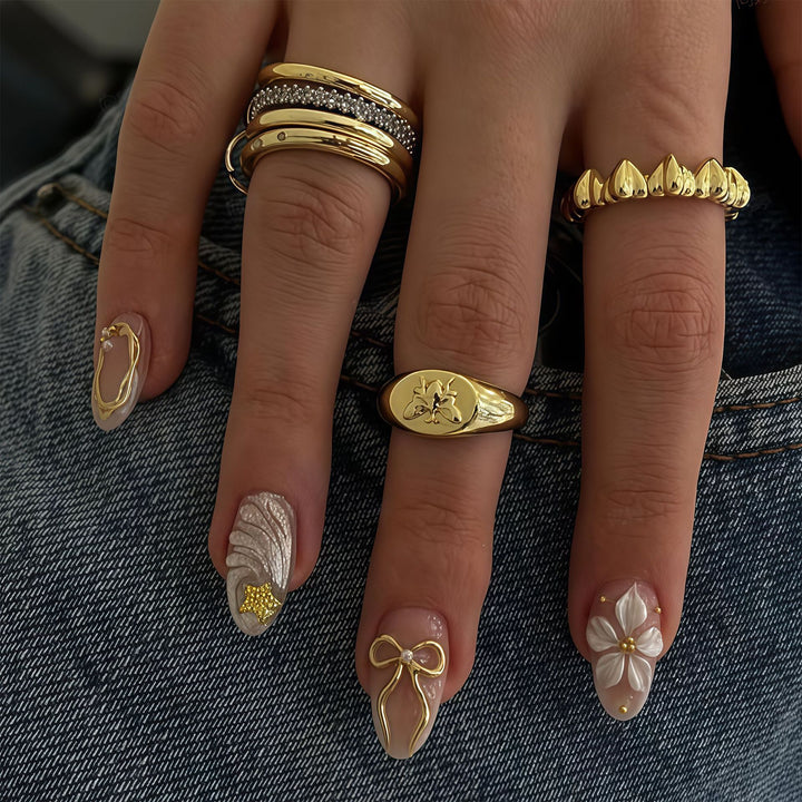 Artistic Press-On Nail Art Set with Decorative Embellishments Kalsten