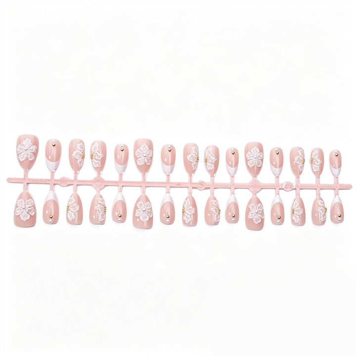 Nail art set with delicate floral patterns and elegant details Kalsten