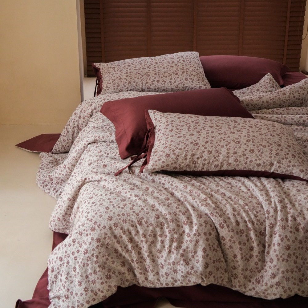 Luxurious bedding set with floral microprint percale and satin finish back