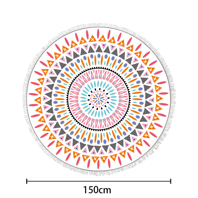 Round beach towel with colorful, tropical floral pattern and fringe decoration Kalsten