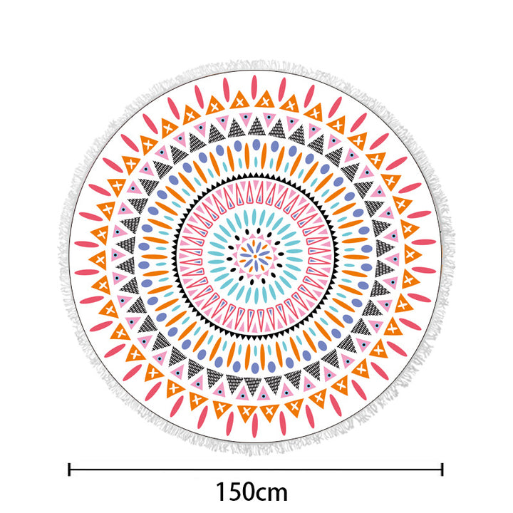 Round beach towel with colorful, tropical floral pattern and fringe decoration Kalsten