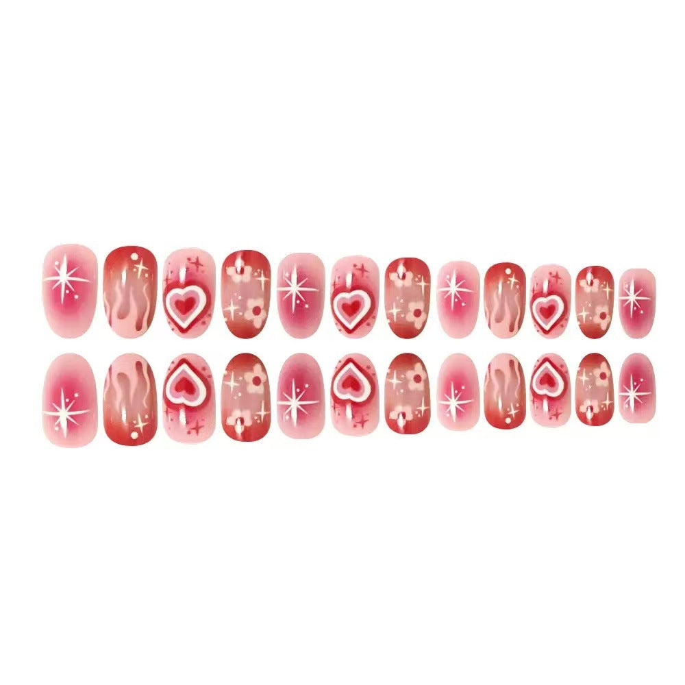 Artificial nail set with romantic heart design and sparkling accents Kalsten