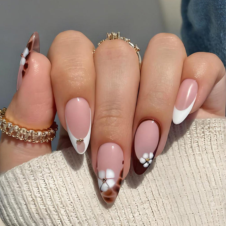 Art nail set with elegant flower and ombré designs Kalsten