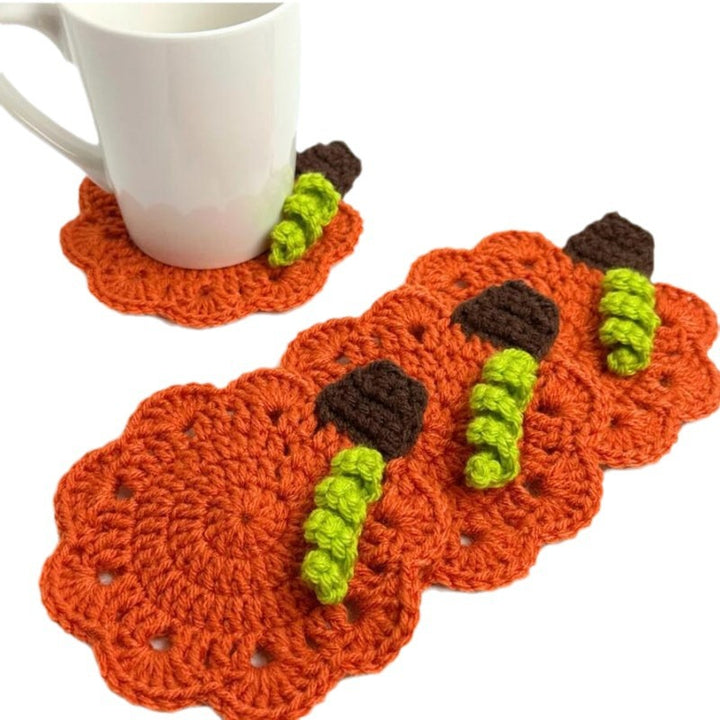 Hand-crocheted pumpkin pot holder and table mat made of cotton yarn