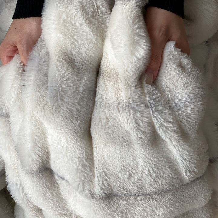 Luxury faux fur throw and cushion set with striped texture