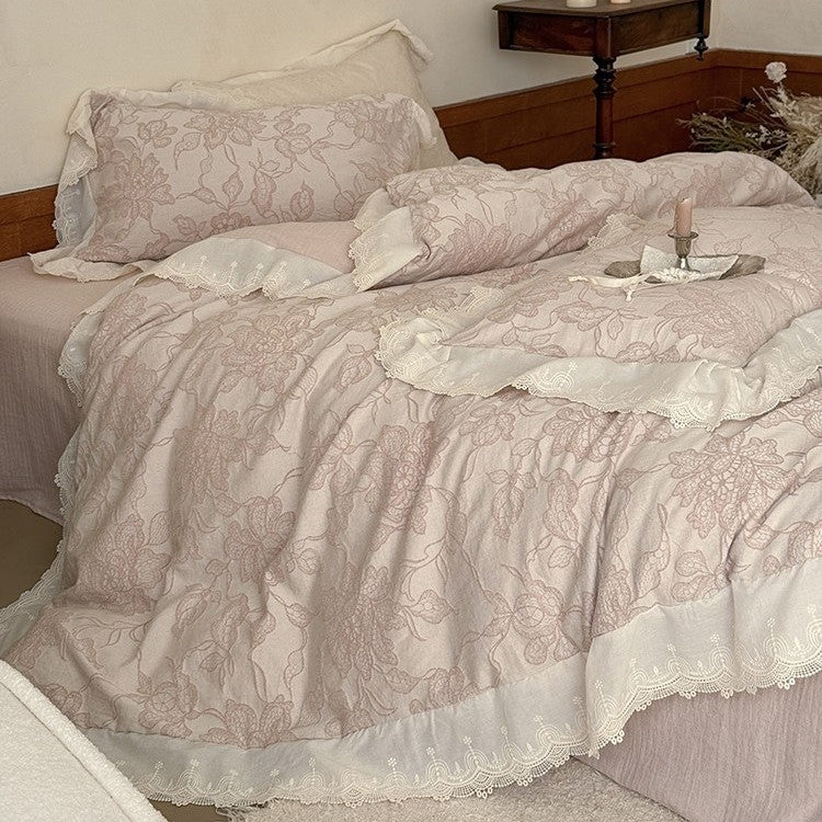 Jacquard bedding set with floral relief pattern and lace border