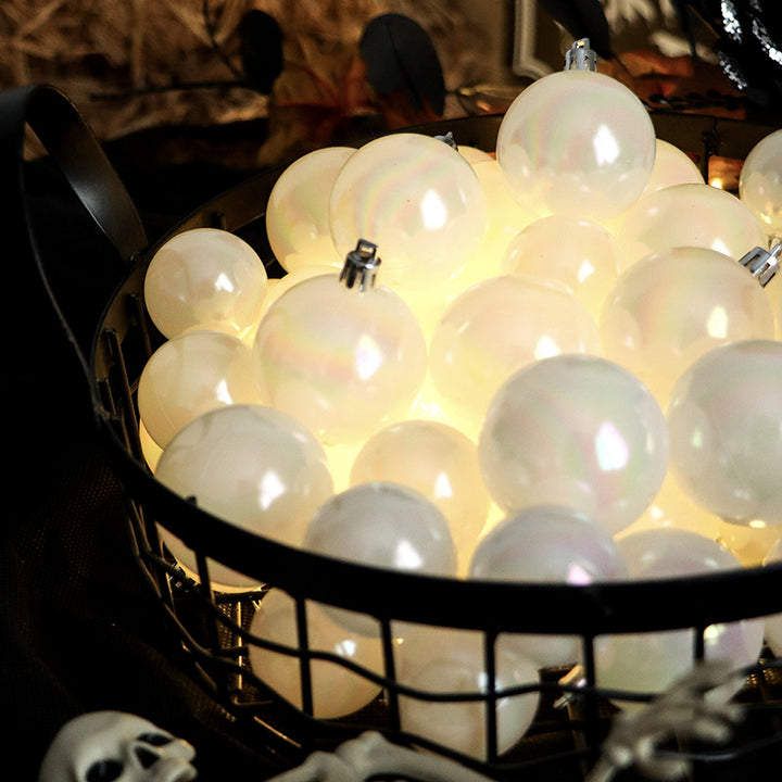 Set of pearl-glossy plastic Christmas ornaments in two sizes