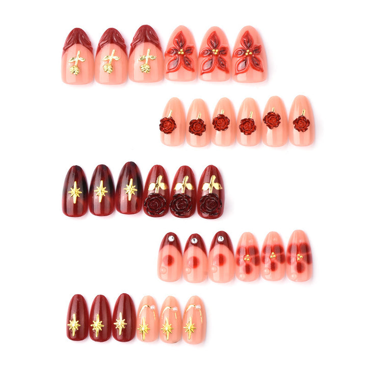 Artificial nail set with elegant floral applications and glamorous accents Kalsten