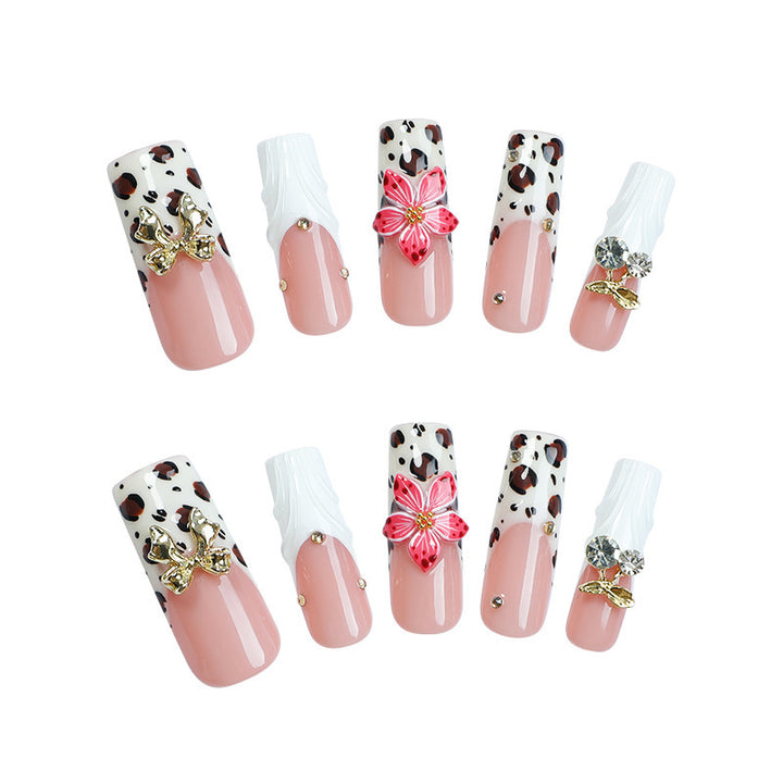 Acrylic nail set with elegant leopard design and floral accents Kalsten