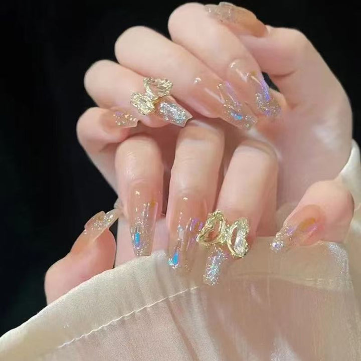 Glamorous artificial nails with delicate flower and glitter effects Kalsten