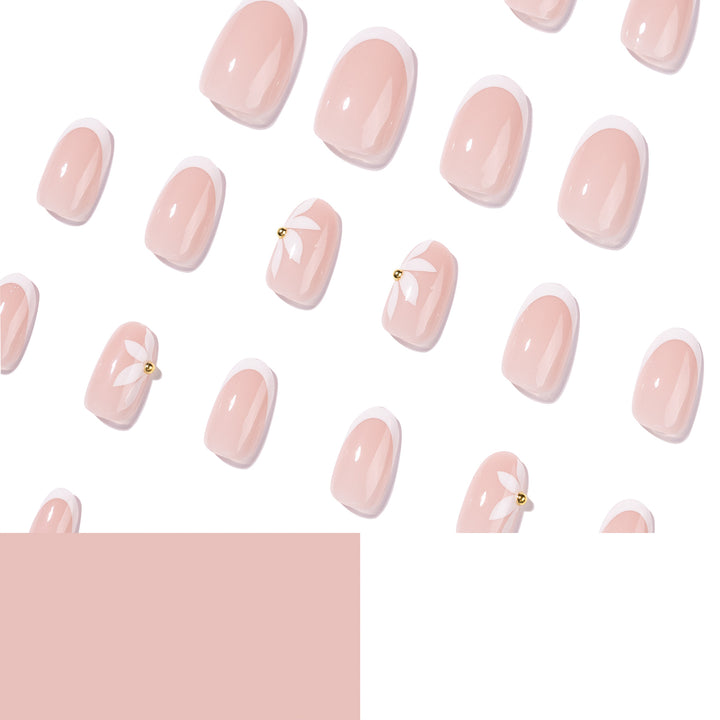 Artful French nails with delicate flowers and glitter accents Kalsten