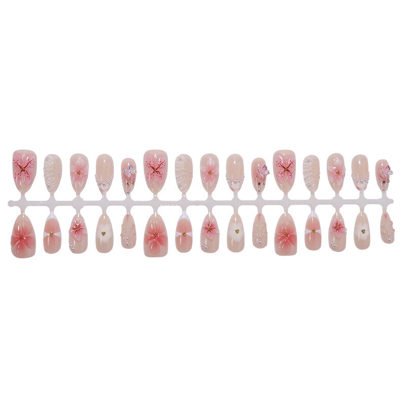 Art nail set with delicate flower and jewelry details Kalsten