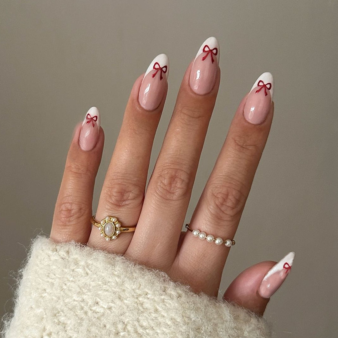 Artificial nail set with playful bow design Kalsten