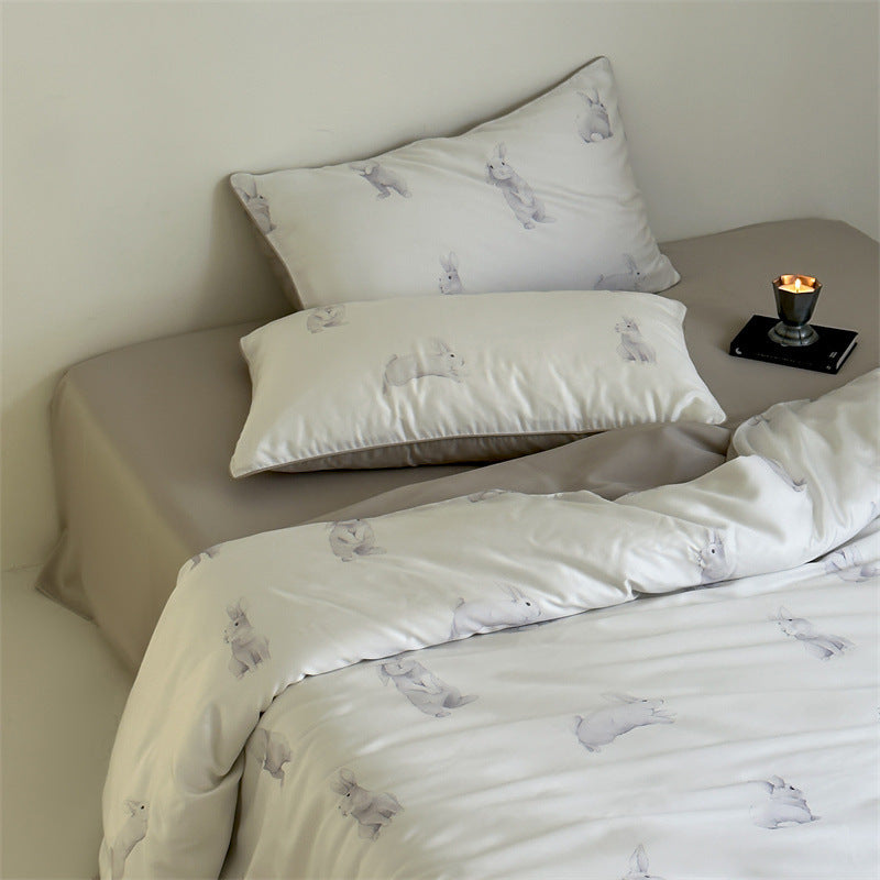 Satin bedding set with floral print and ruffle