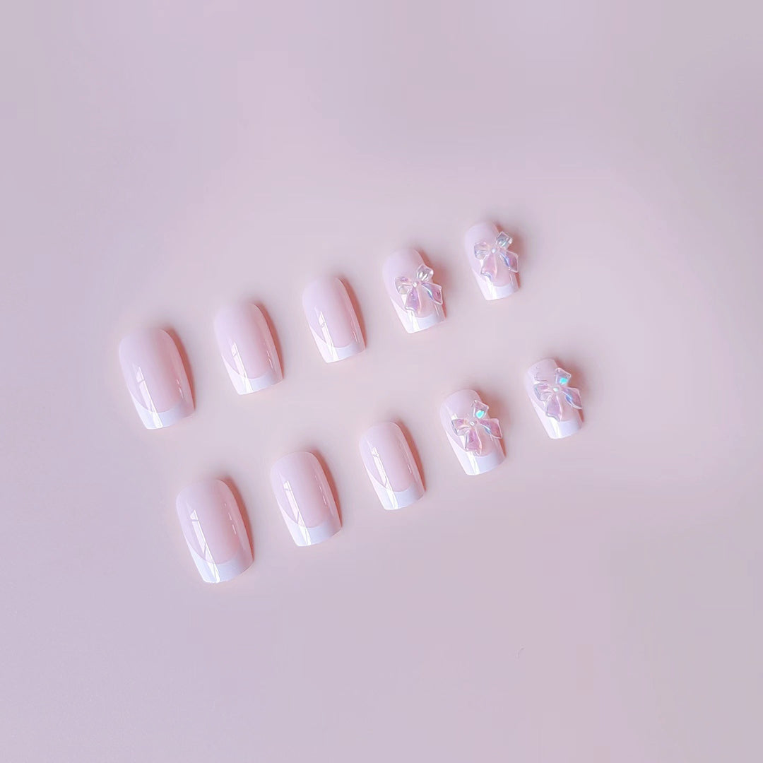 Acrylic nail set with elegant French tips and 3D details Kalsten