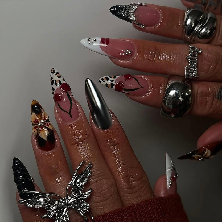 Artful Stiletto Fingernails with Unique Design Elements Kalsten