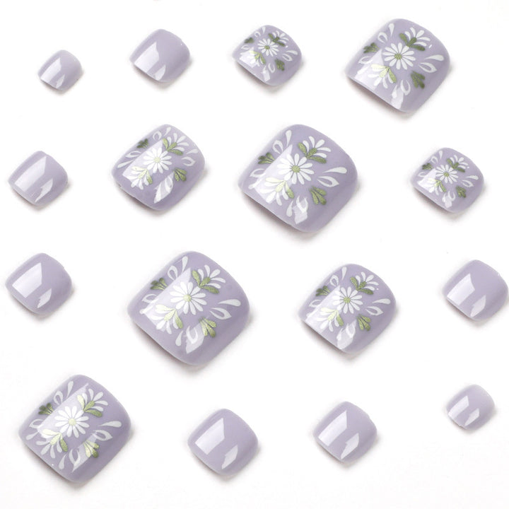 Artistic toenail design with elegant floral design Kalsten