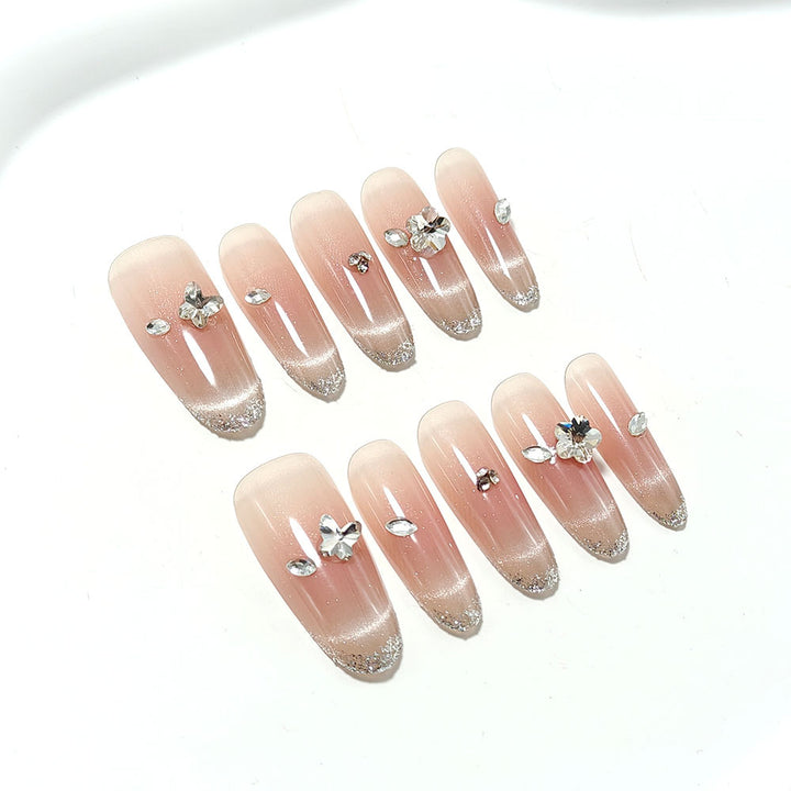 Glamorous artificial nails with rhinestone decorations Kalsten