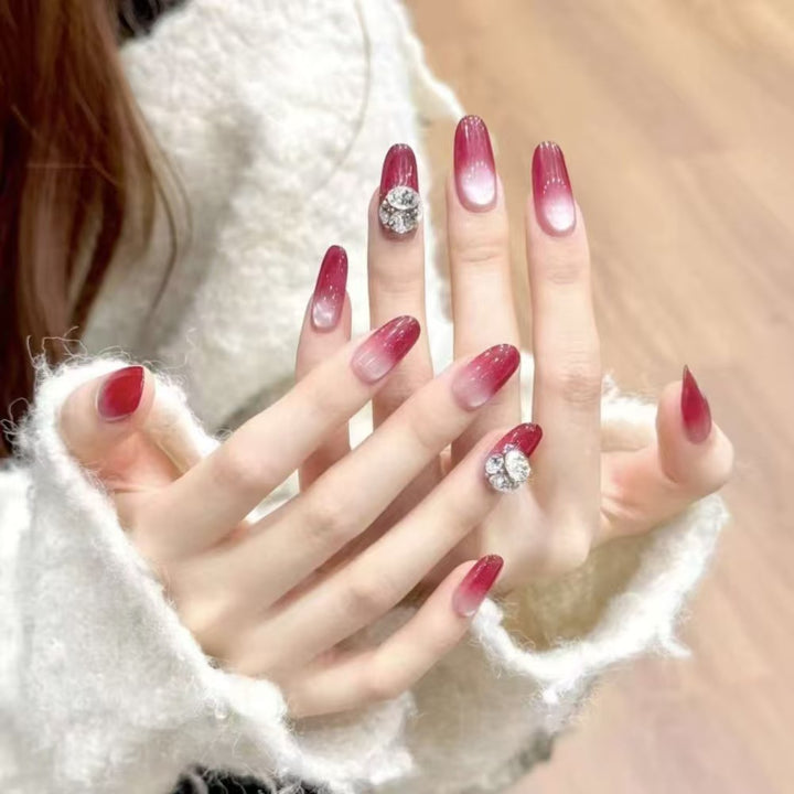 Artificial nails with elegant ombre effect and rhinestone decoration Kalsten