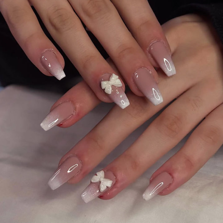 Artful acrylic nails with elegant butterfly design Kalsten