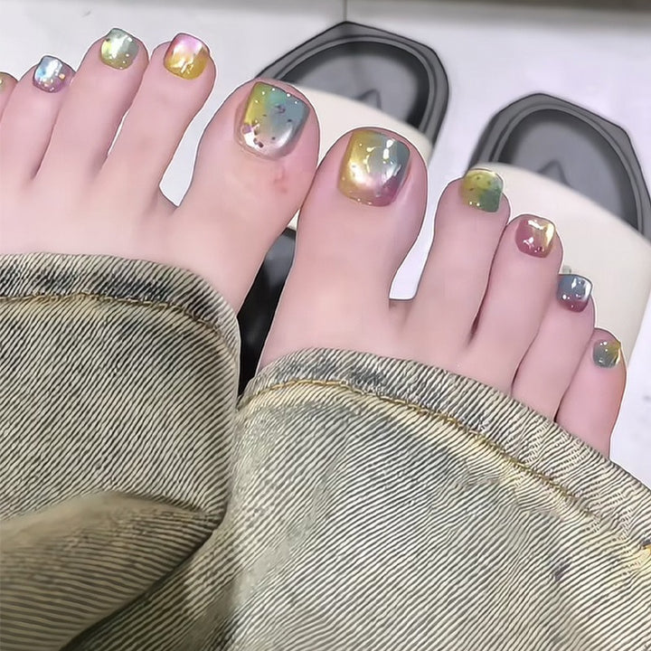 Acrylic nail set with shimmering gradient and elegant designs Kalsten