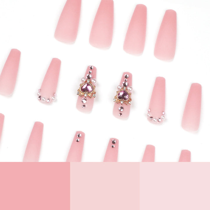 Creative artificial nails with heart-shaped decorative accents Kalsten