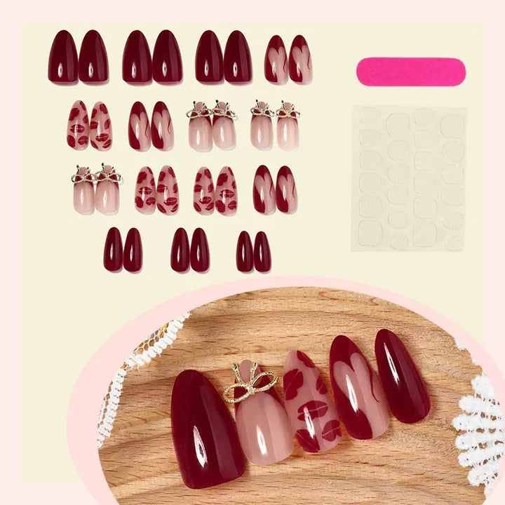 Acrylic nail set with elegant lip motifs and bow decorations Kalsten