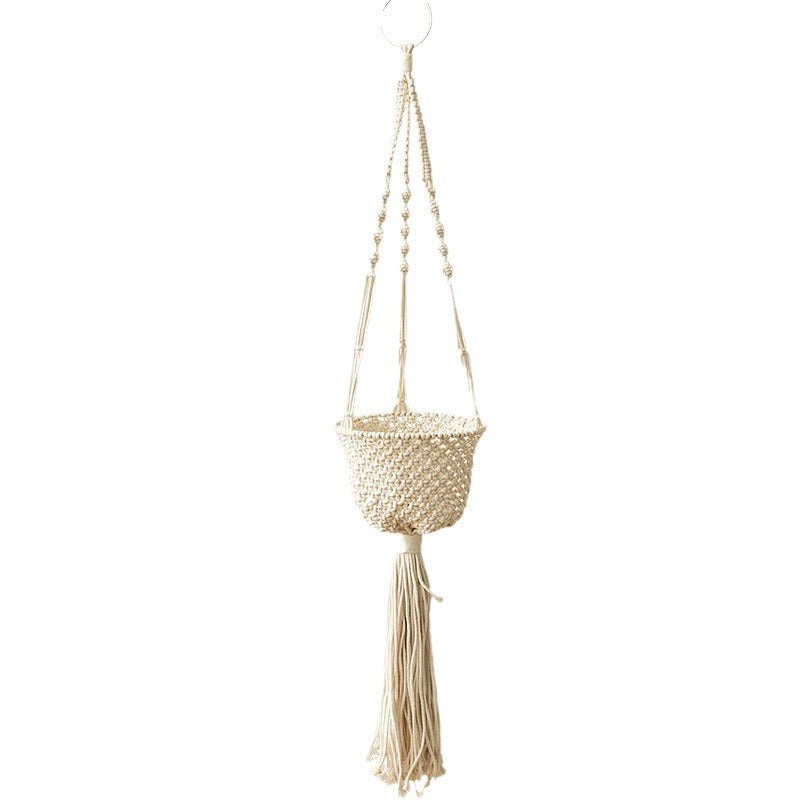 Macrame plant hanger made of cotton rope with tassels and adjustable suspension Kalsten