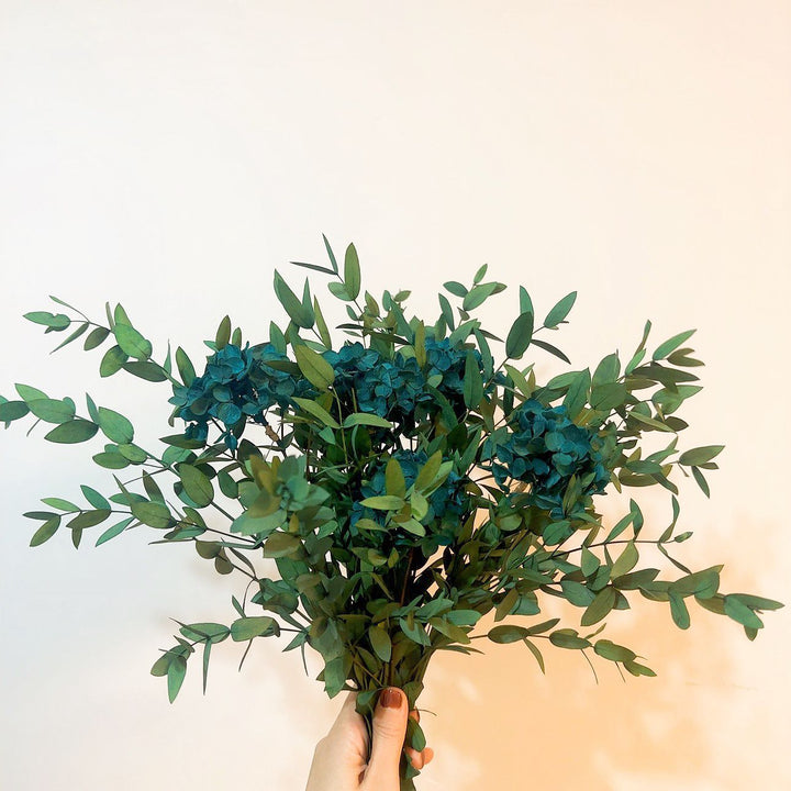 Lifelike Floral Bouquet with Green Foliage