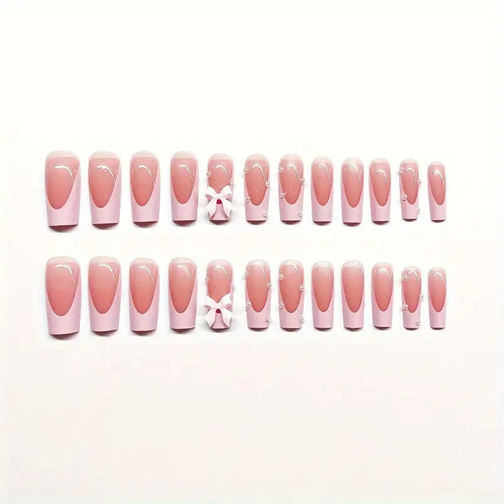 Artificial nail set with romantic bow and glitter details Kalsten