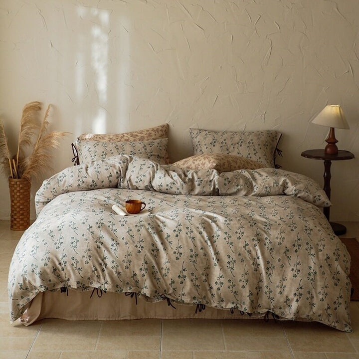 Finely woven cotton bedding set with delicate floral print and decorative ties