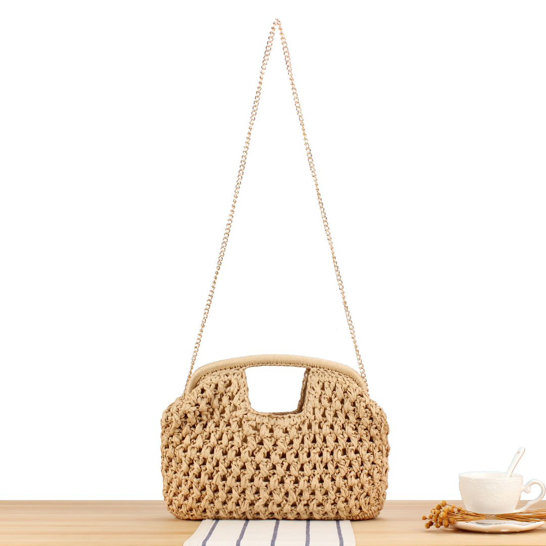 Handbag made of naturally untreated woven material with elegant chain embellishment Kalsten