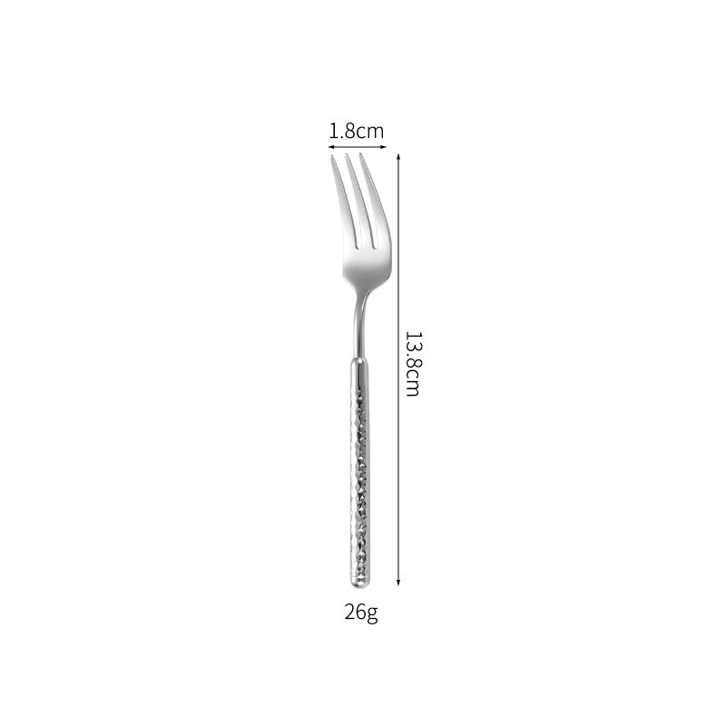 Elegant dessert spoon with elaborate handle design Kalsten