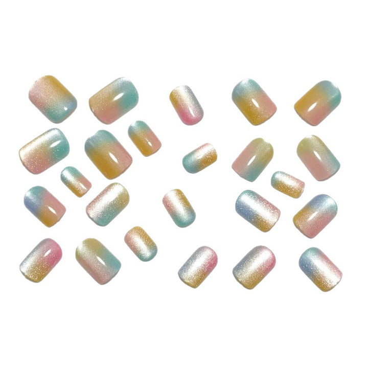 Artificial nails in delicate ombre design with glitter effects Kalsten