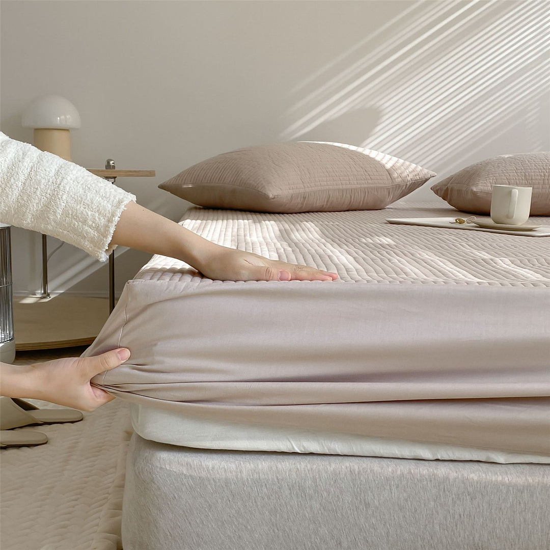 Quilted mattress topper fitted sheet with elastic all-around rubber