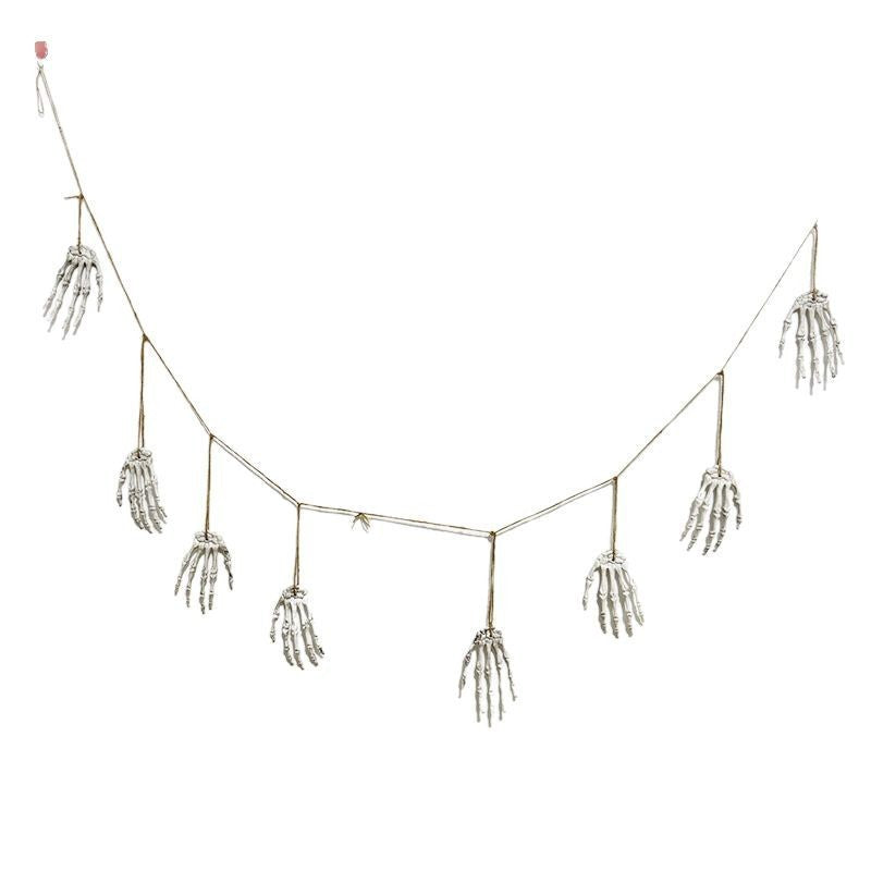 Decorative garland with skeleton hands