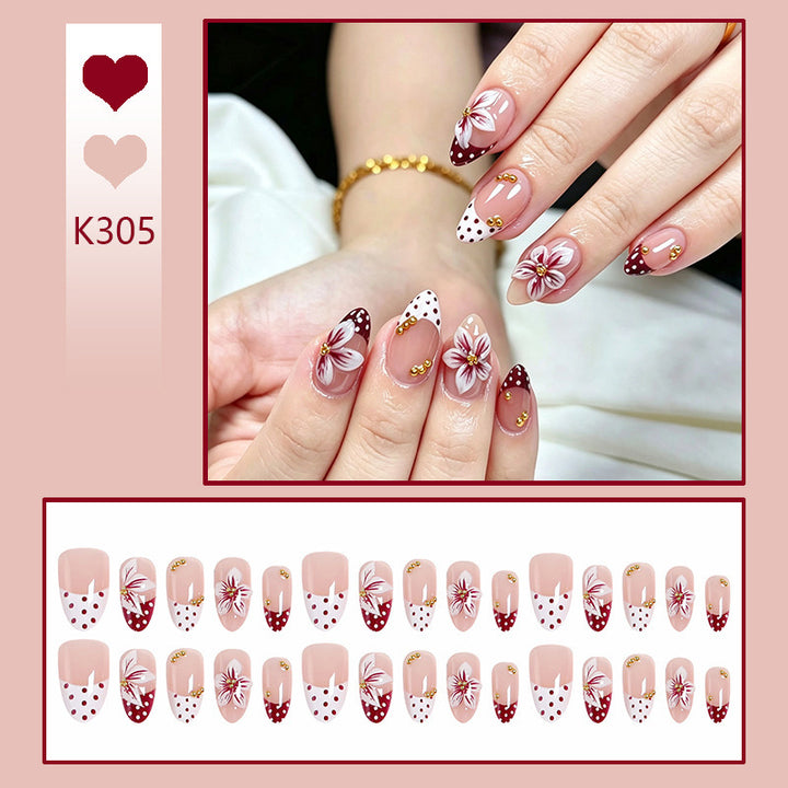 Artificial nail set with floral design and golden accents Kalsten