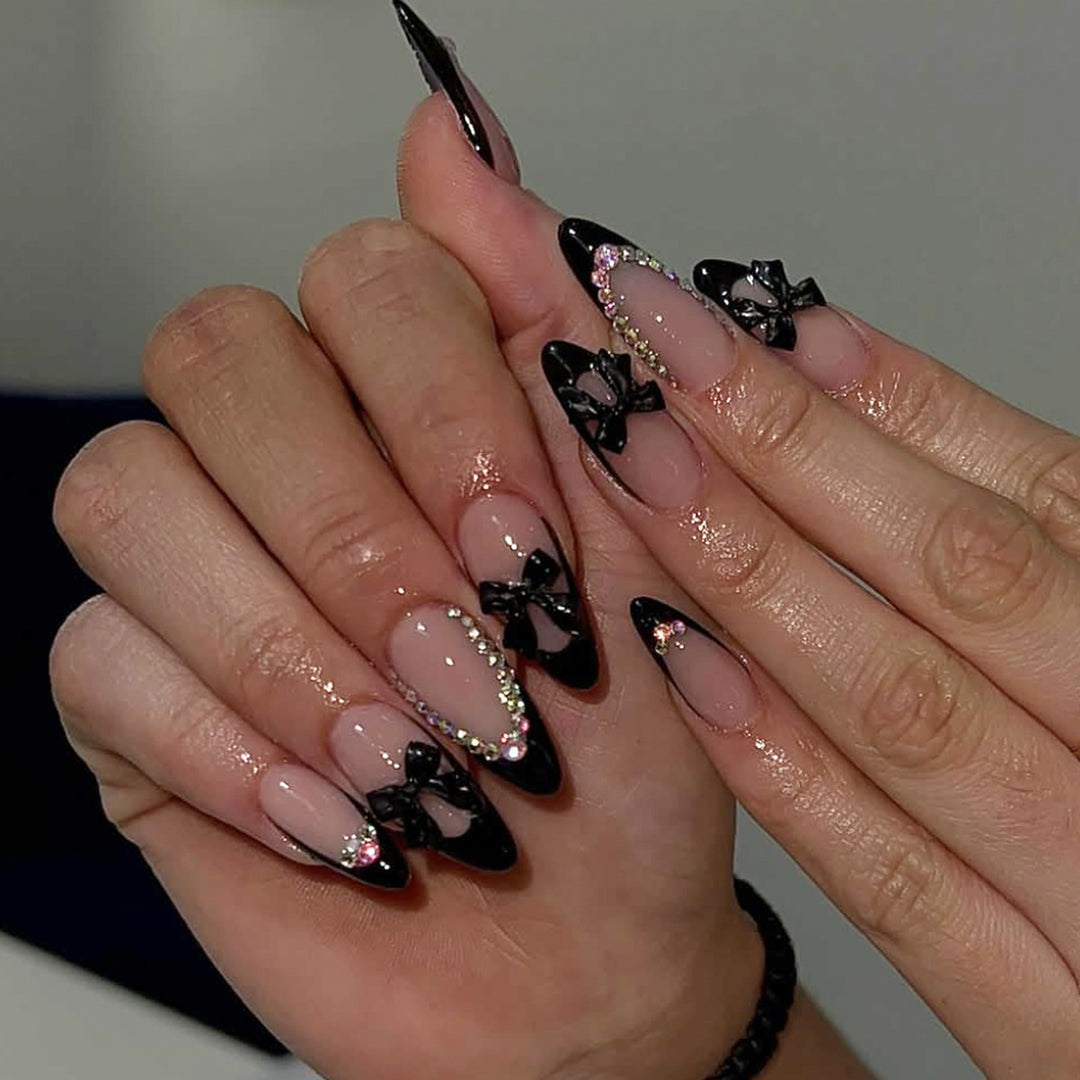 Elegant Stiletto Nail Design with Rhinestone Accents Kalsten