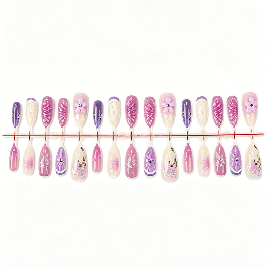 Decorative artificial nails with floral designs and glitter accents Kalsten