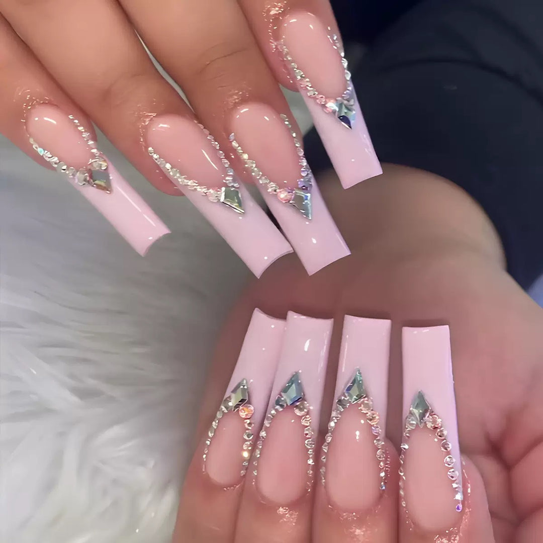 Glamorous artificial nails with sparkling rhinestone embellishments Kalsten